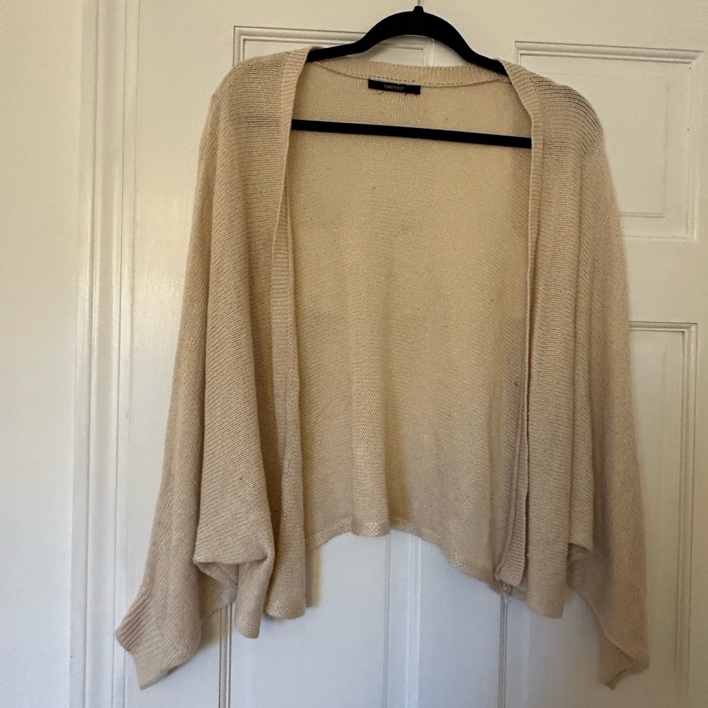 Winged sweater small stain on front